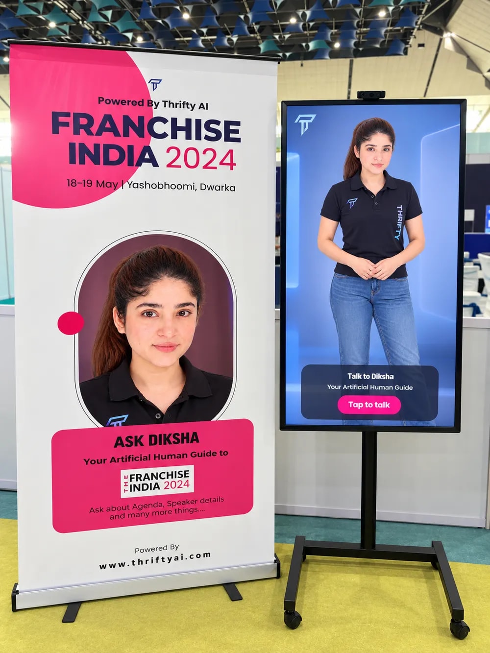 A Thrifty AI kiosk with a life-size AI guide next to a Franchise India 2024 banner